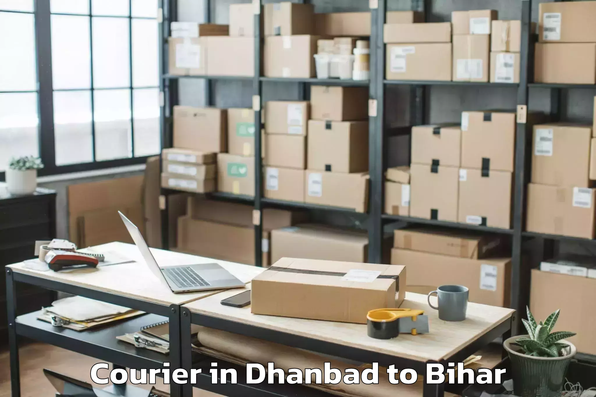 Get Dhanbad to Narpatganj Courier